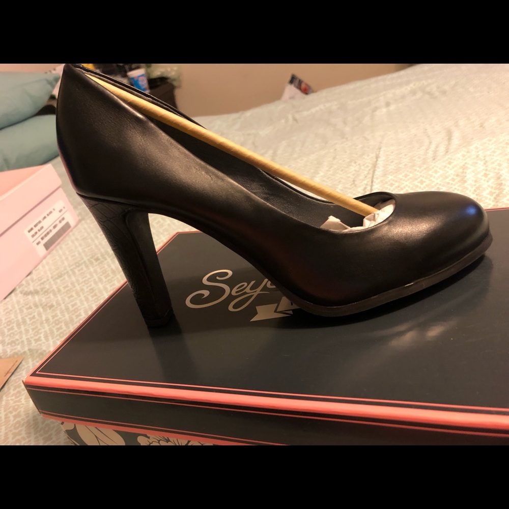 Brand new black leather crochet embossed heel